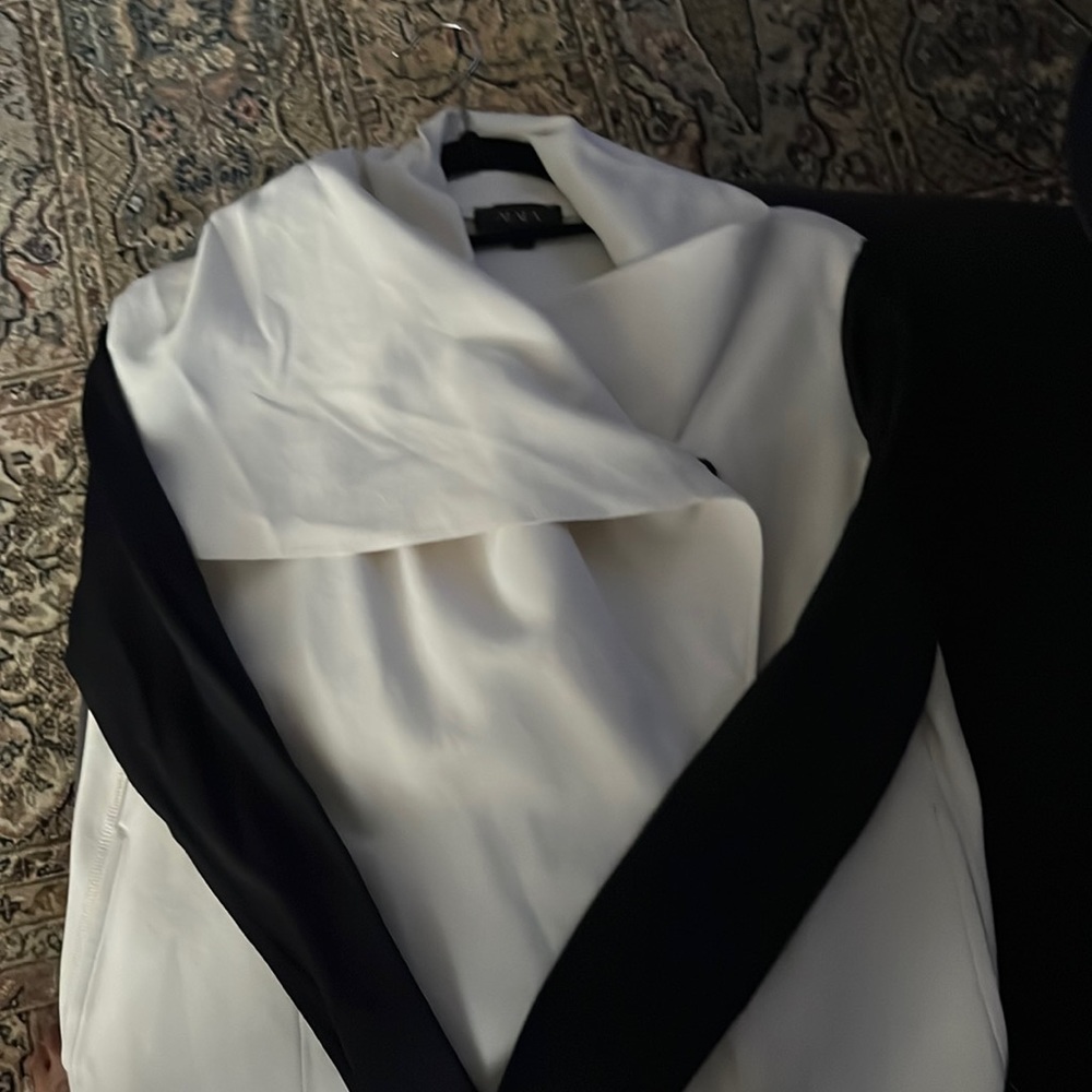 Alala jacket… cream with black sleeves. Size XS
